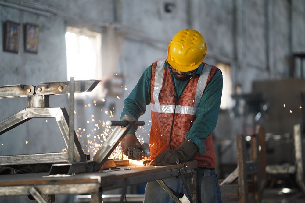 Hand Grinding Worker